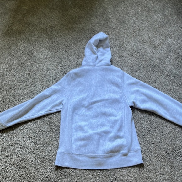 This is an orange and grey zip up hoodie that has never been worn. - Picture 3 of 4